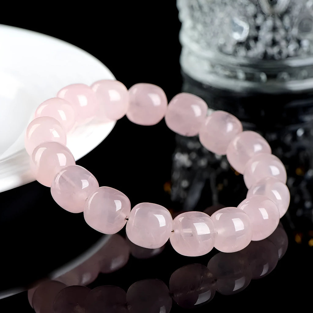 Pink bamboo crystal barrel bead bracelet with 11-12mm geometric design