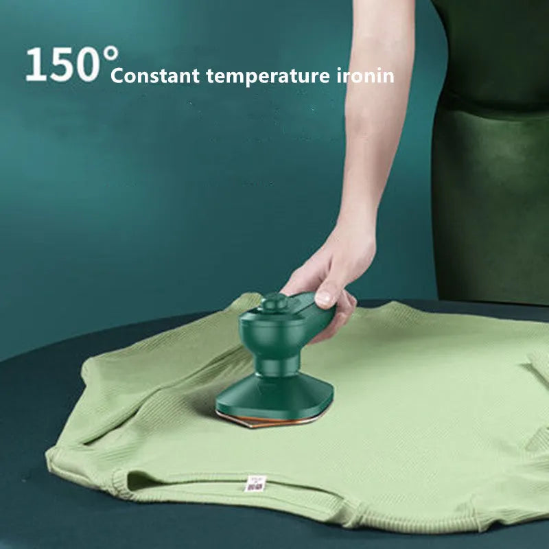 Dark green portable hanging steam iron machine with ceramic panel and compact design.