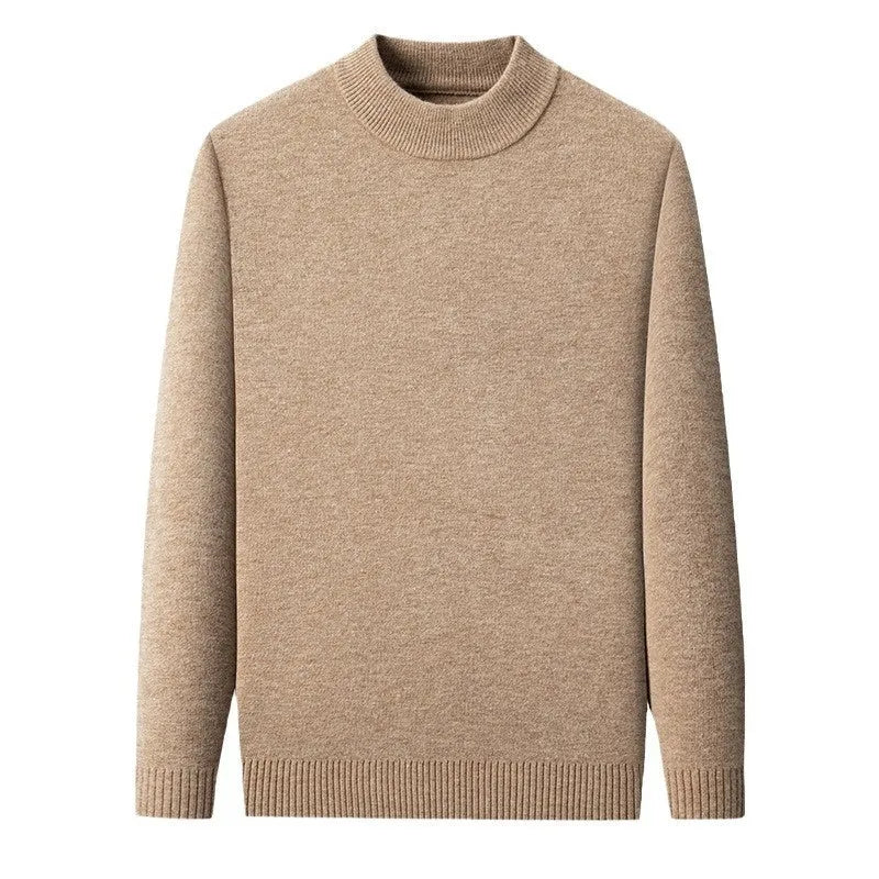 Man wearing a solid colour half turtleneck long sleeve jumper in a casual setting.