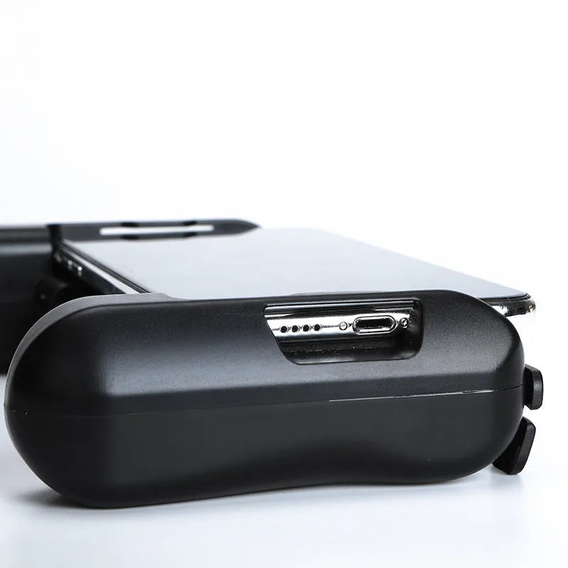Black Cooling Bluetooth P2 game controller for iPhone on a dark surface.