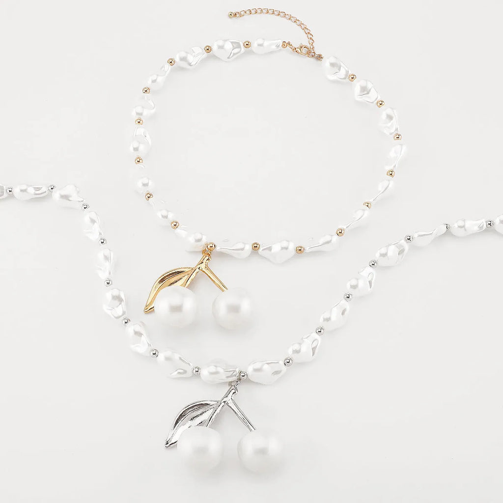 Women's adjustable pearl cherry fruit necklace with gold electroplated alloy pendant and geometric design
