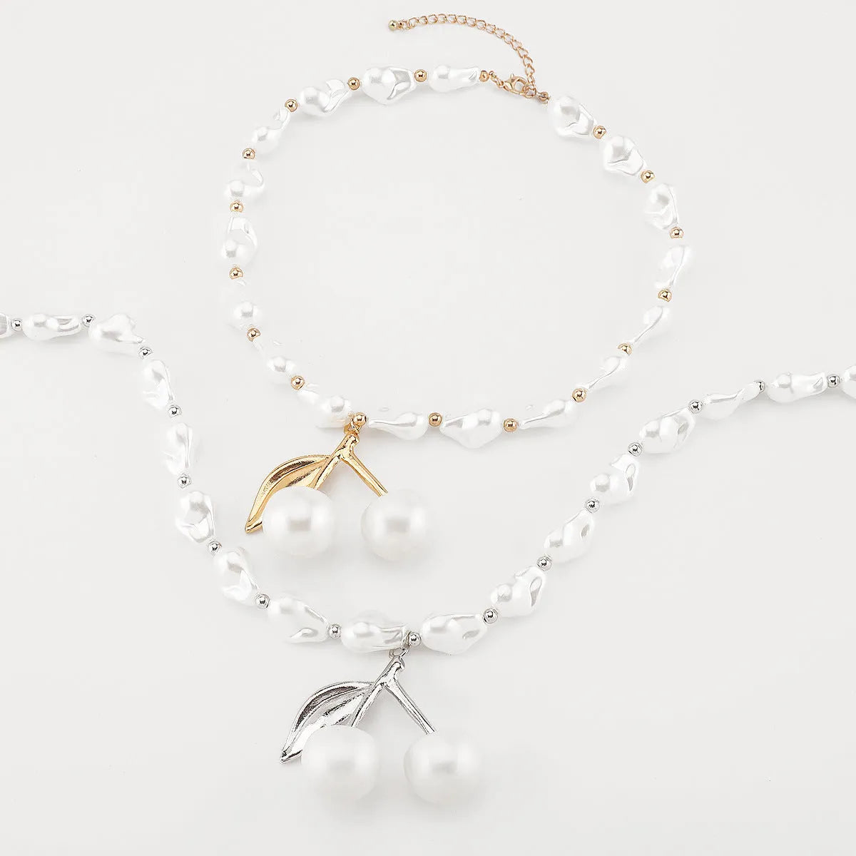 Women's adjustable pearl cherry fruit necklace with gold electroplated alloy pendant and geometric design