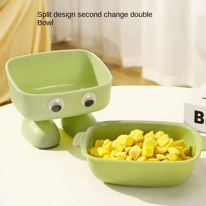 Elevated robot-shaped cat bowl with tilted design and detachable inner bowl in green colour
