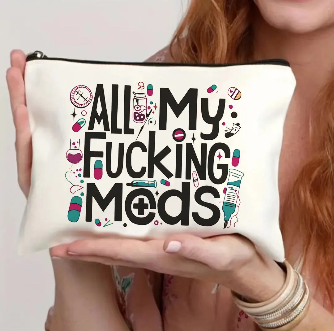 Canvas-style polyester cosmetics bag with a zipper, shown in multiple colour options.