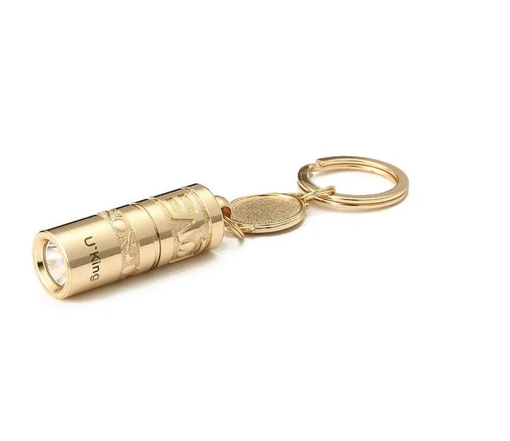 Gold zinc alloy waterproof LED flashlight attached to a keychain.