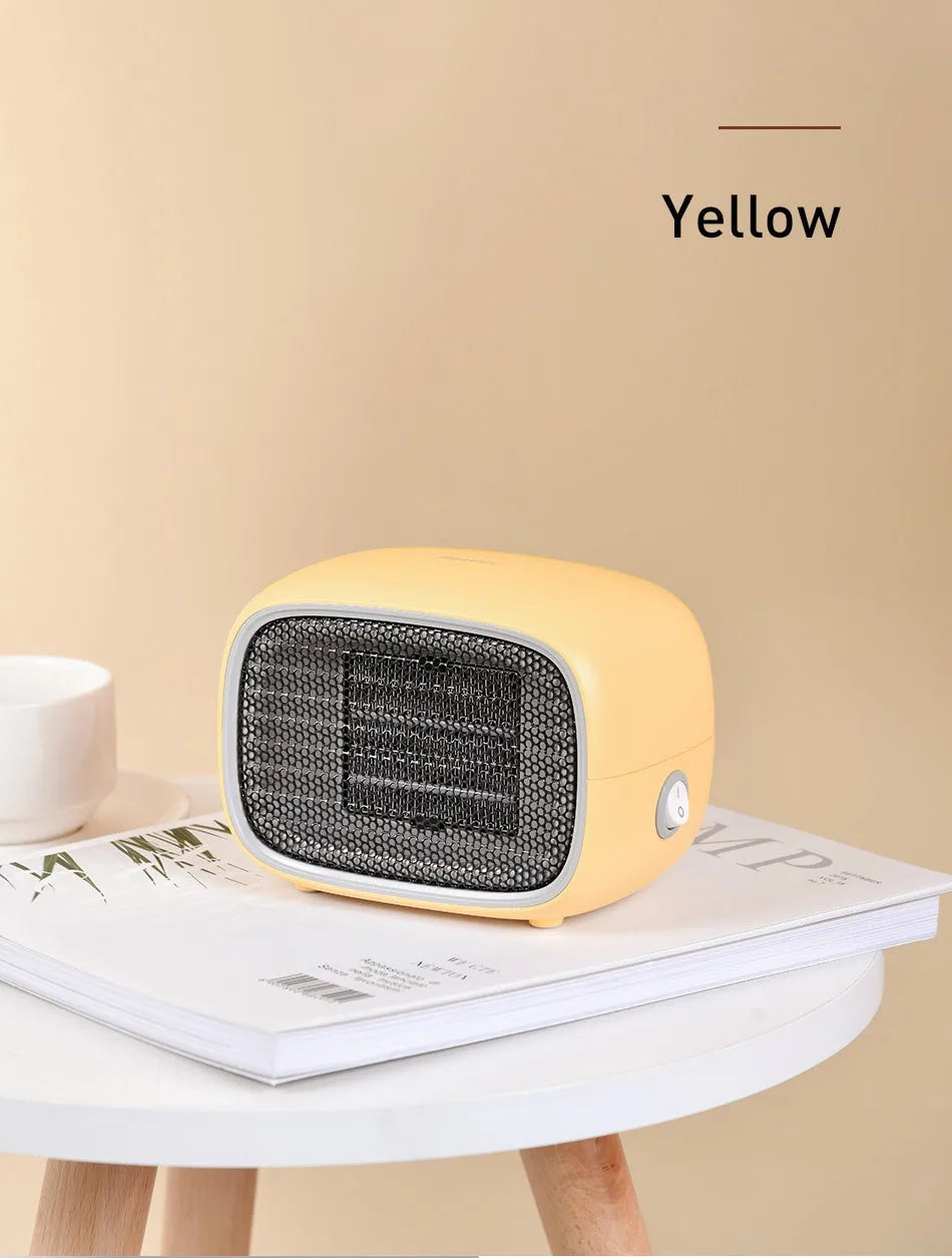 Compact green ceramic PTC heater with metal mesh front measuring 158mm long