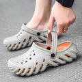 Men's beige hollow-out EVA slipper sandals with non-slip sole and round toe, shown on a white background.