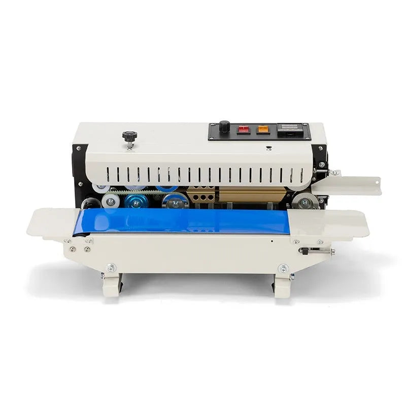Handheld L1 steel seal style heat sealer with date printer on a countertop.