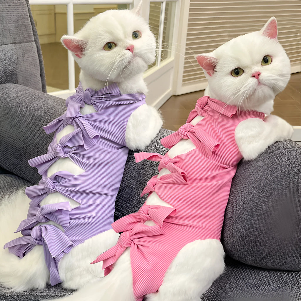 Lace-up polyester cat sterilisation recovery garment shown in blue, brown, green pineapple, pink, or purple