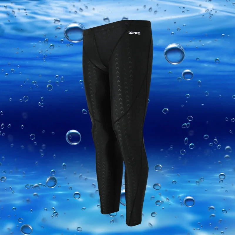 Men's black nylon cropped swimming trunks with a coloured line detail and brief style