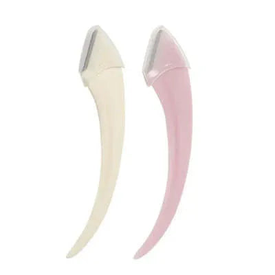 Close-up of a white and pink eyebrow trimming knife with a small curved plastic comb on a plain background.