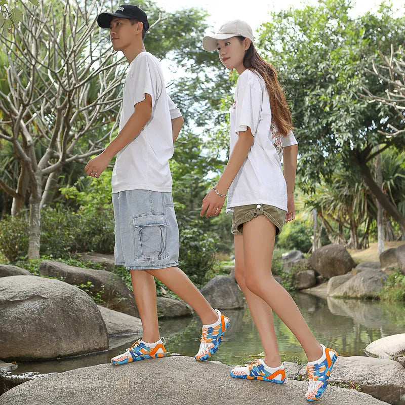 Men's and women's quick-drying lace-up wading shoes with mesh upper and textured rubber sole.
