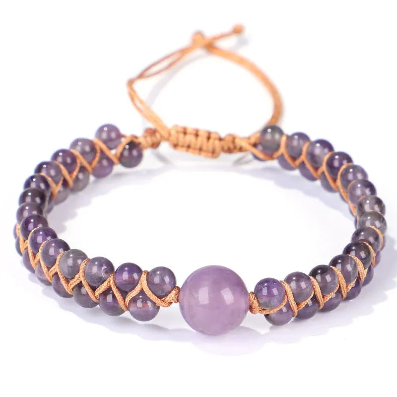 Handmade woven bracelet with geometric pattern in blue tigereye or amethyst stone beads