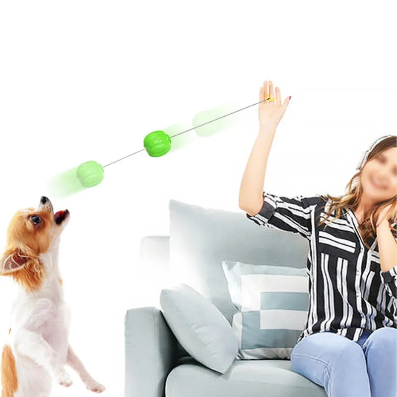 Green, orange, and yellow plastic pumpkin-shaped squeaky dog ball toy for small breeds.