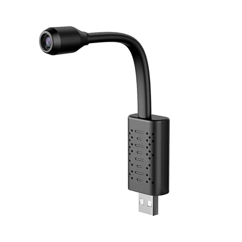 Black V380 wireless USB security camera on a table with night vision and two-way audio.