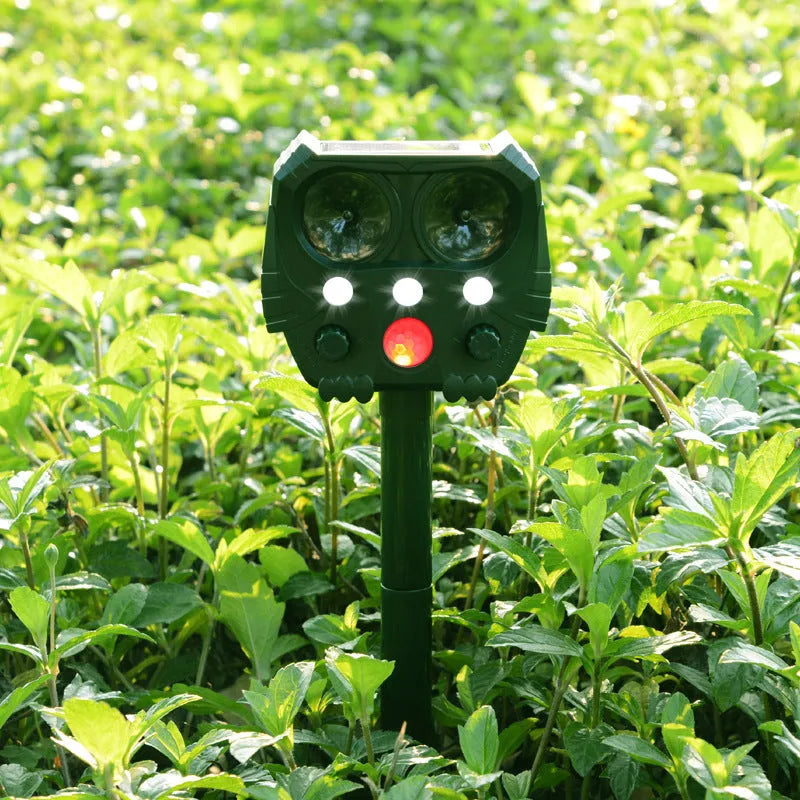 Green solar ultrasonic animal repeller device for outdoor garden pest control