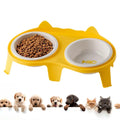 Blue ceramic cat food and water bowls in an elevated white ABS plastic stand with a hook