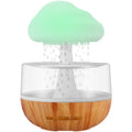 White raining cloud shaped humidifier with colour changing lights and water drop aromatherapy function