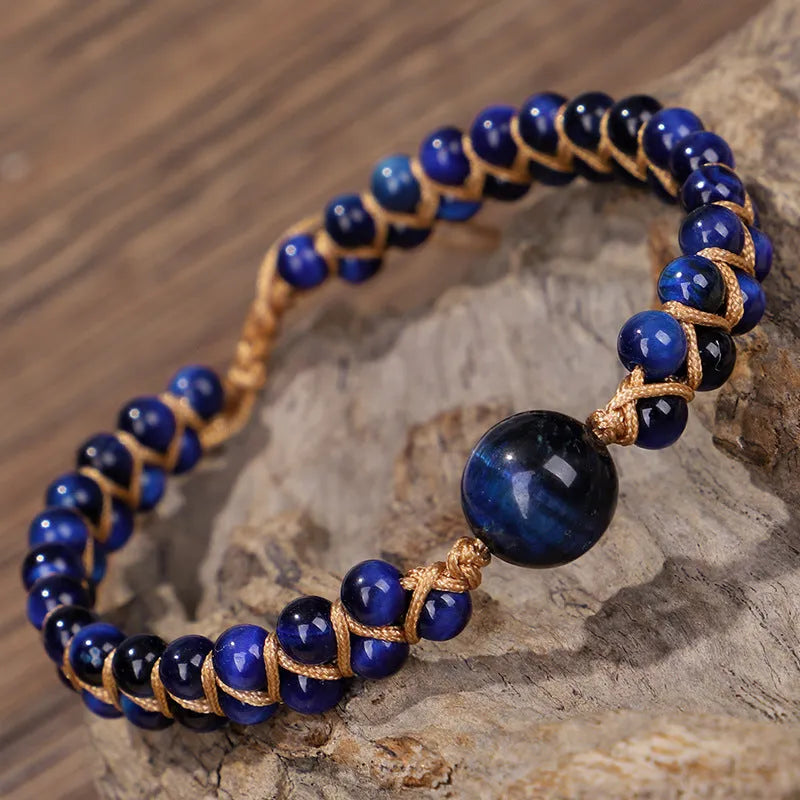 Handmade woven bracelet with geometric pattern in blue tigereye or amethyst stone beads