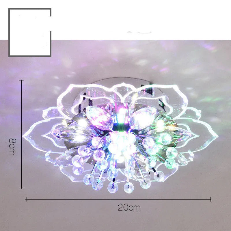 Small modern crystal ceiling lamp with flower-shaped shade in crystal, acrylic, and stainless steel materials