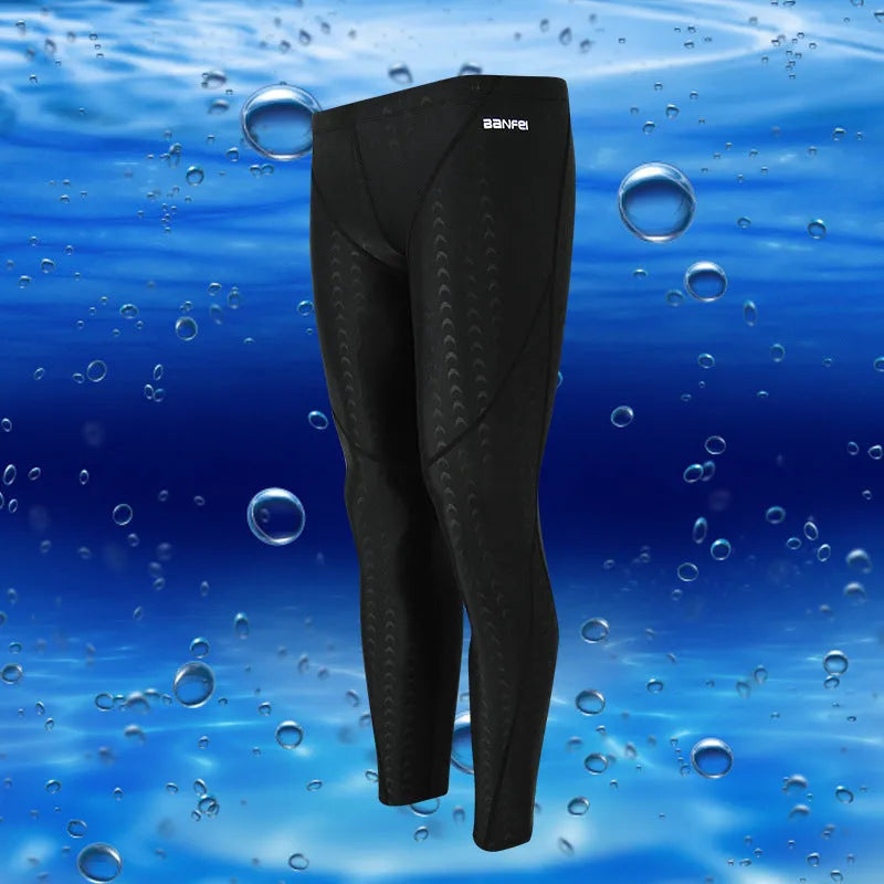 Men's black nylon cropped swimming trunks with a coloured line detail and brief style
