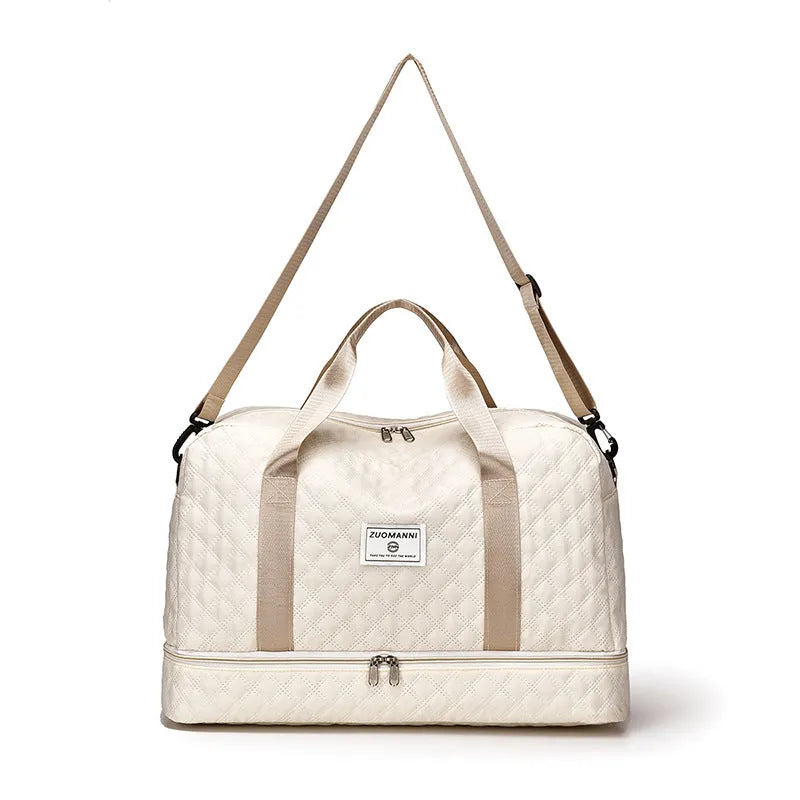 Large Oxford cloth leisure travel bag in a solid colour with sewing thread detail, shown in a 36-55L capacity size.
