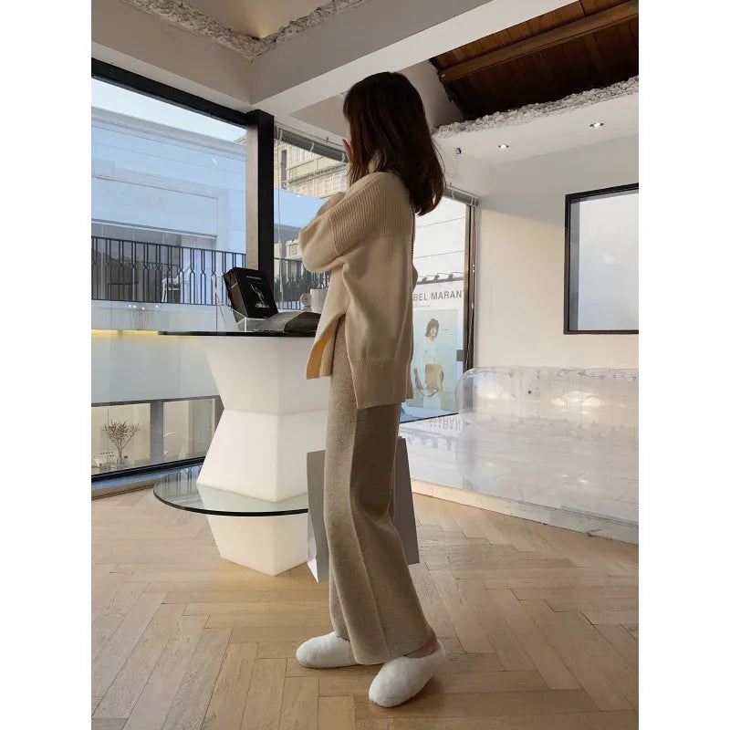 Women's high waist knitted wide-leg trousers in black colour showing straight-leg drooping style