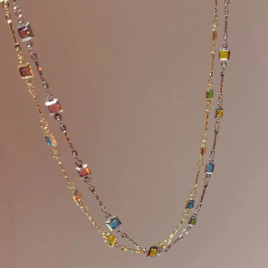 Square colour crystal clavicle chain necklace with geometric pendants in gold tone finish