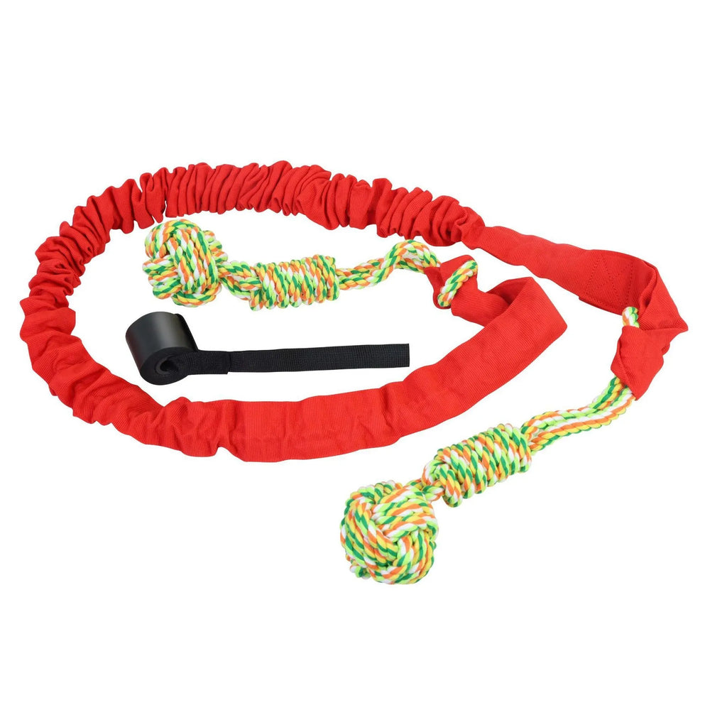 A thick woven cotton dog tug of war rope toy in red, held at both ends.