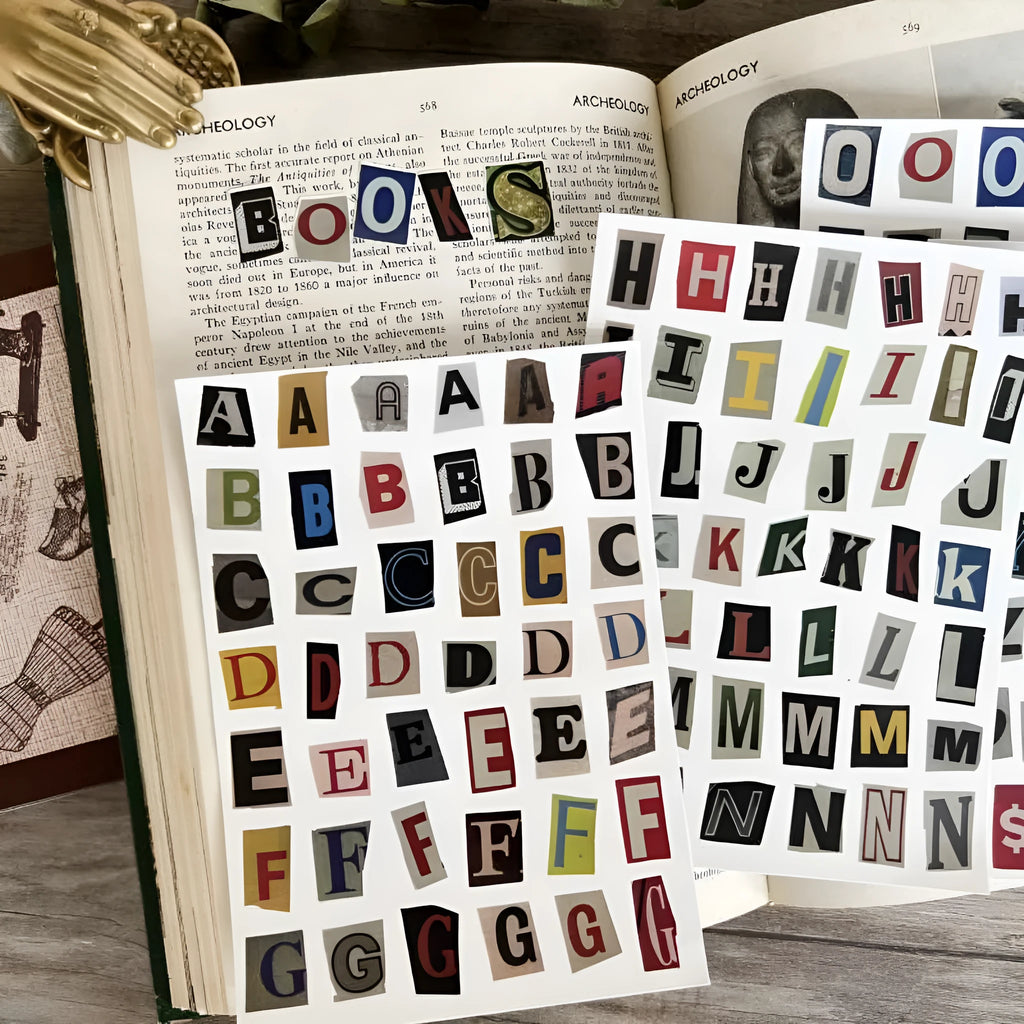 Set of printed English letter, number, and weekly word decoration stickers in assorted colours, laid out flat.