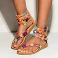 Ethnic beaded petal sandals with round toe and floral decoration on artificial PU upper