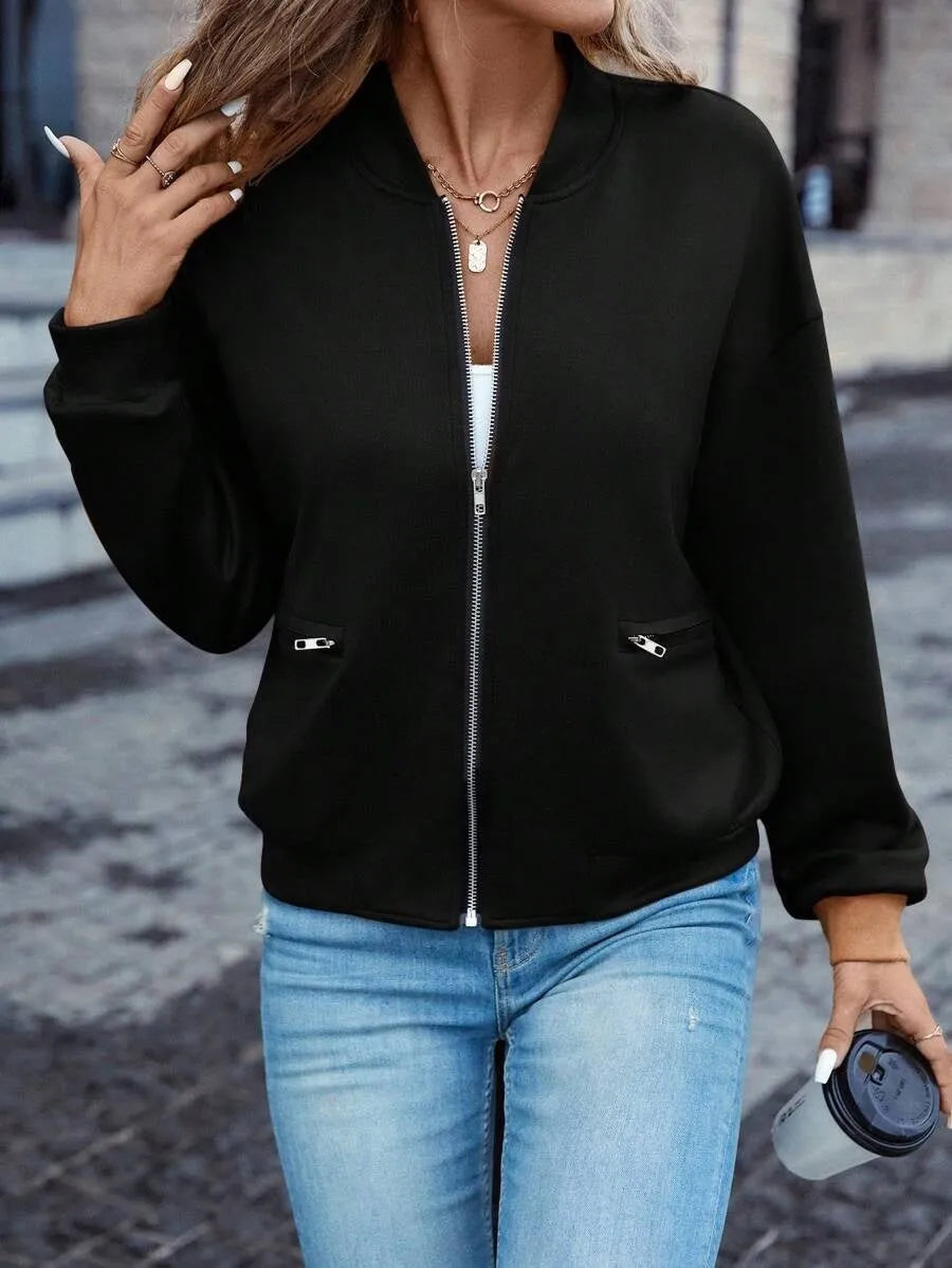 Women's black casual zip jacket with long sleeves and faux pocket detail