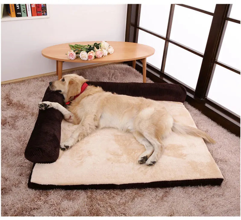 Corduroy fabric dog bed with bolster sides in a choice of coffee, grey, or red colours on a non-slip base.