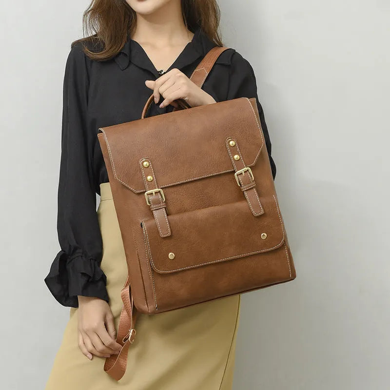 Korean style simple retro backpack in soft PU material shown in black, brown, creamy white, and dark brown colours.