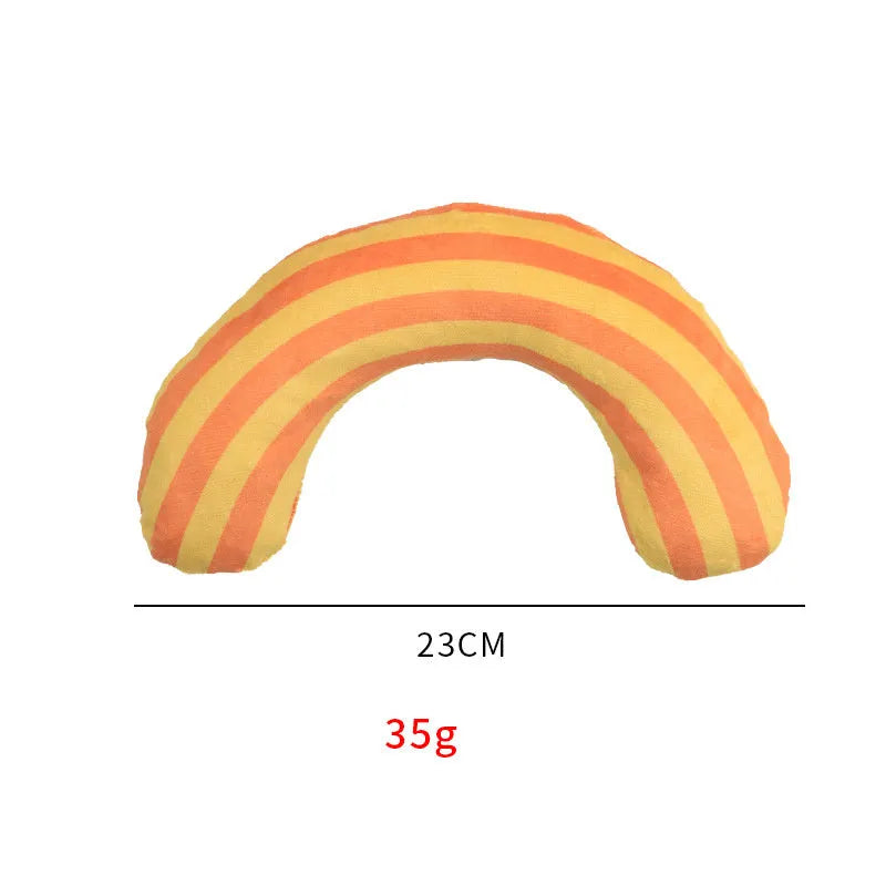 Green, rainbow, and yellow cat toy set with noise-maker, catnip, and a striped pillow measuring 23 by 20 cm.