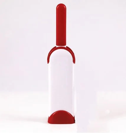 Blue reusable pet hair removal brush with self-cleaning base for sofas and upholstery.