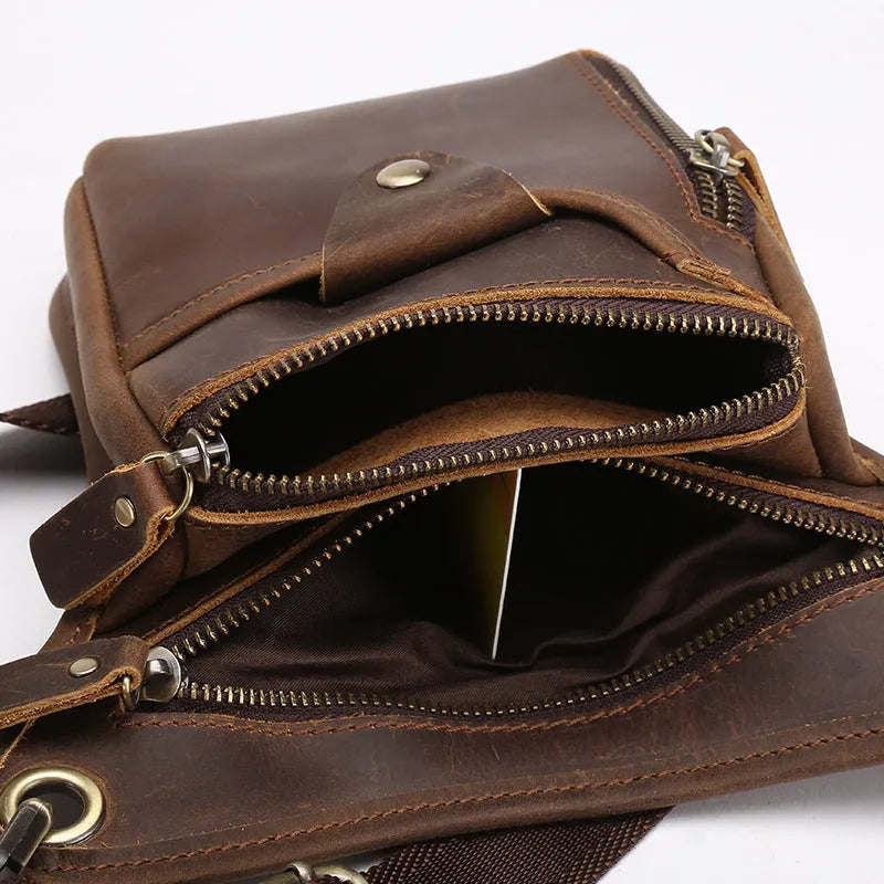 Men's brown Crazy Horse leather vintage satchel bag with top handle and crossbody strap.