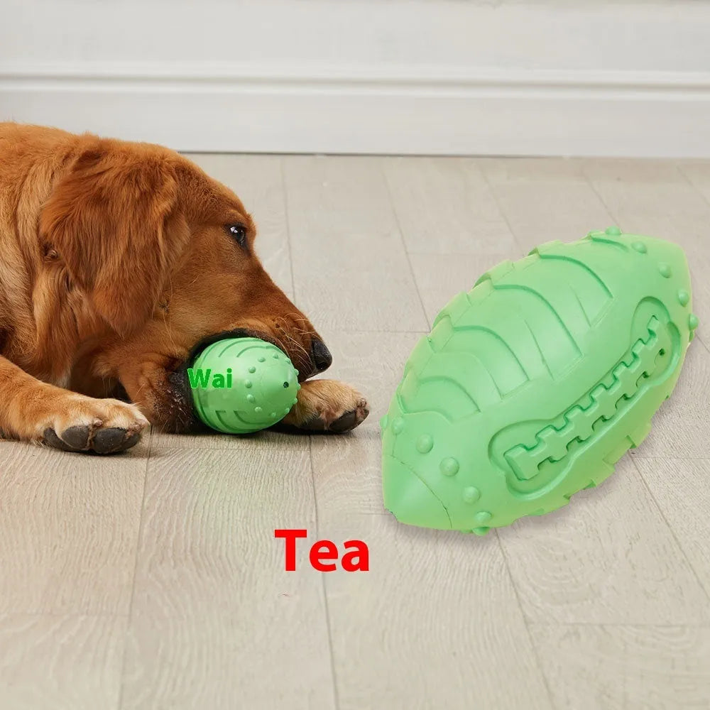 Light green rubber rugby ball dog toy with textured surface for teeth cleaning