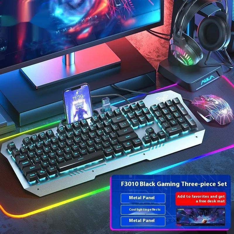 Metal mechanical keyboard bundle with gaming mouse, headset, and optional mouse pad on a desk.