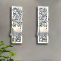 Pair of silver mirror glass wall candle holders with crystal candlesticks, modern design.
