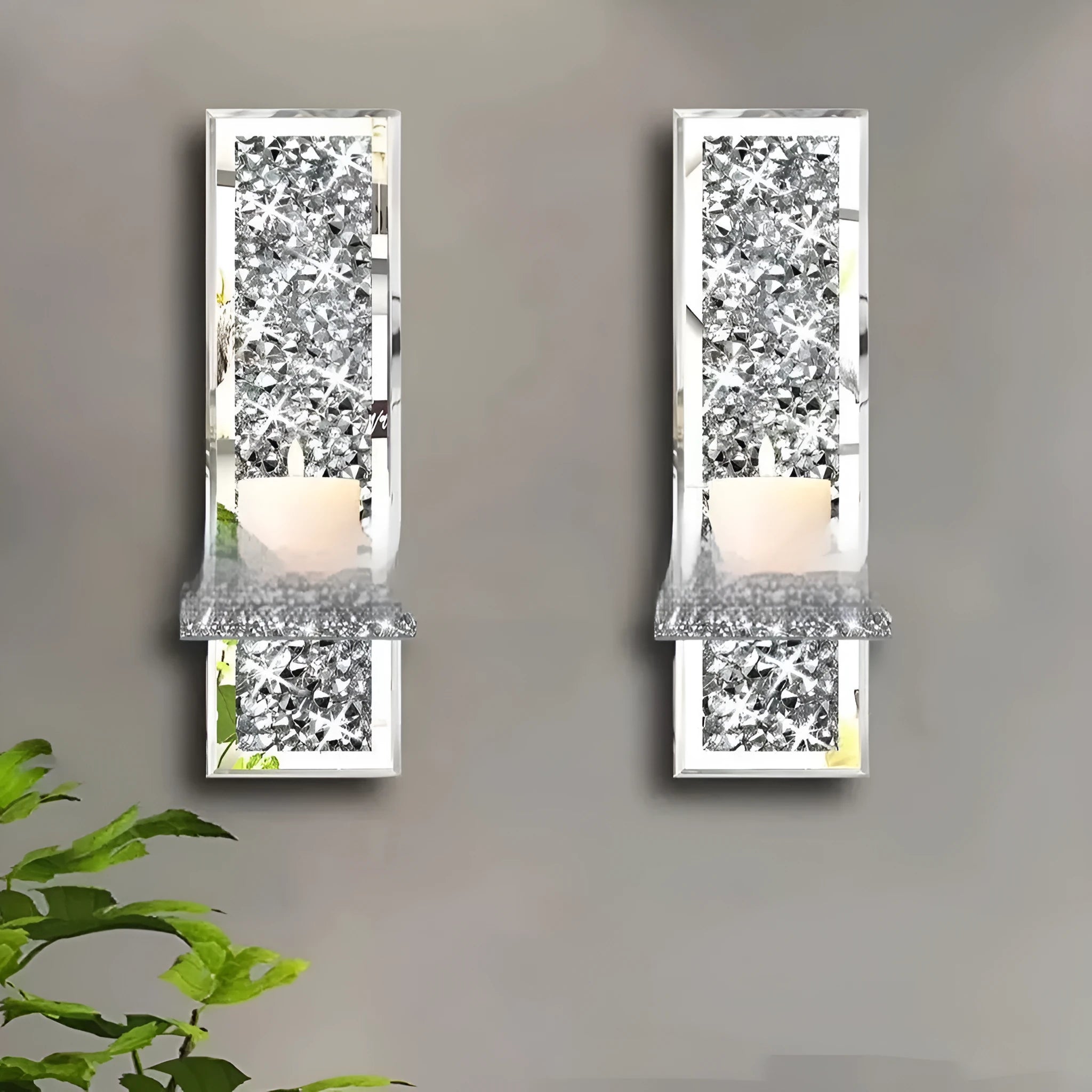 Pair of silver mirror glass wall candle holders with crystal candlesticks, modern design.