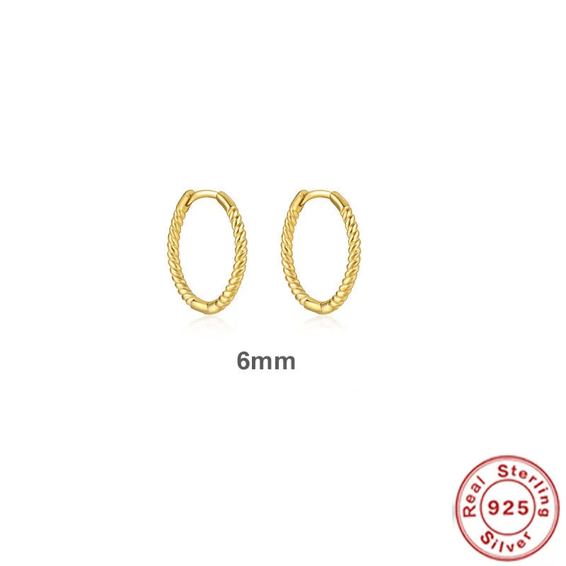 Sterling silver twisted hoop earrings with geometric round shape in gold electroplated finish