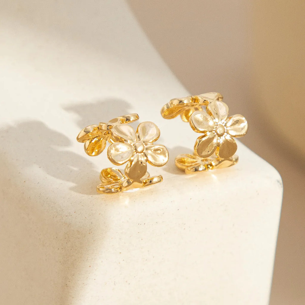 Gold starfish and scallop drop earrings with conch details on alloy hooks