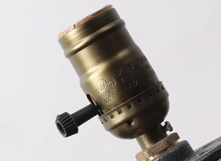 Wood and iron water pipe table lamp measuring 9cm wide by 13cm high with E26/E27 socket