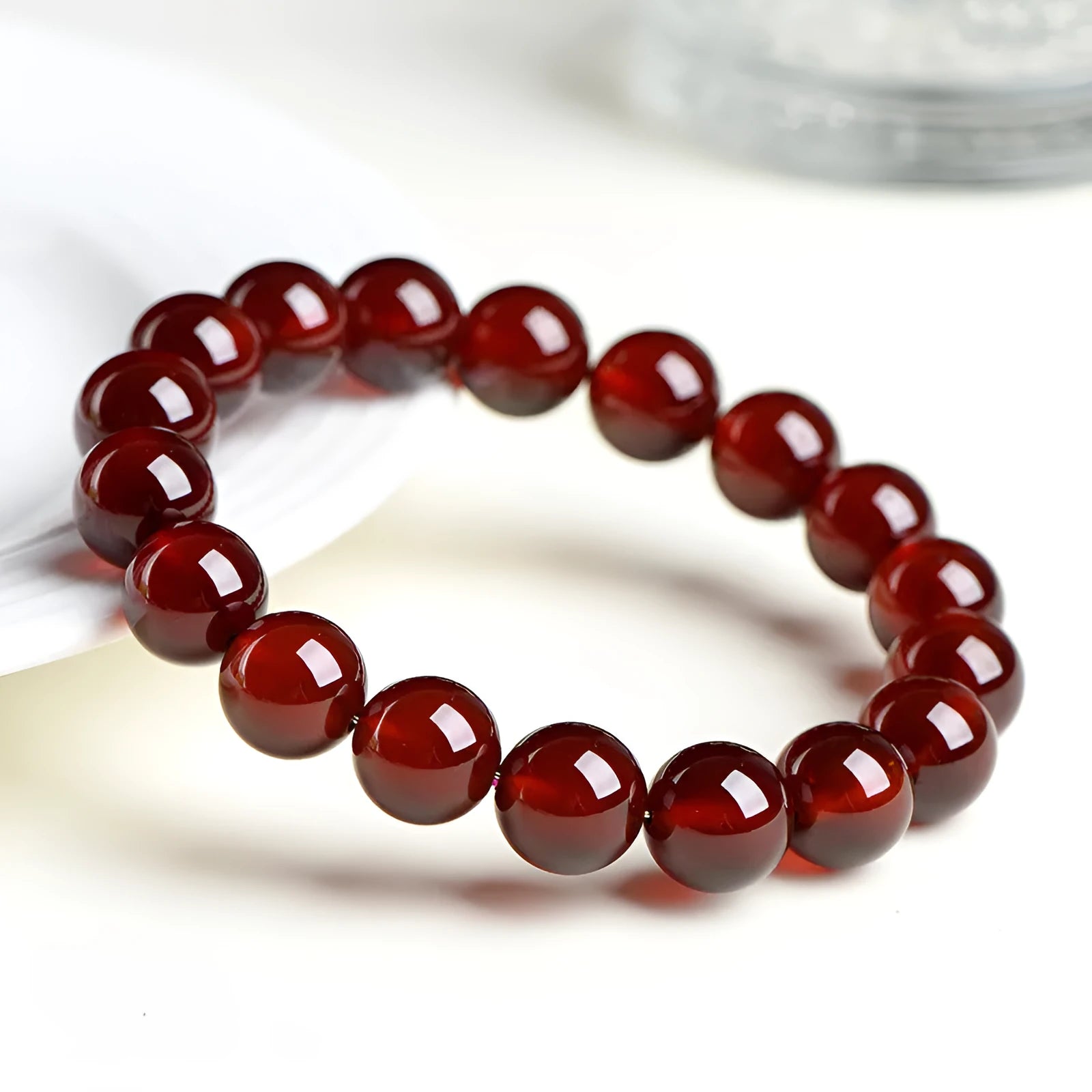 Natural orange red garnet ball crystal bracelet with Ruyi design elements in retro style