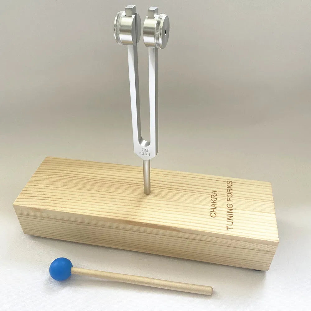 Aluminium alloy 432Hz tuning fork and portable speaker set in kraft paper box.