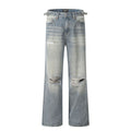 Men's blue straight-leg jeans with ripped detailing on the legs and a zipper fly closure.
