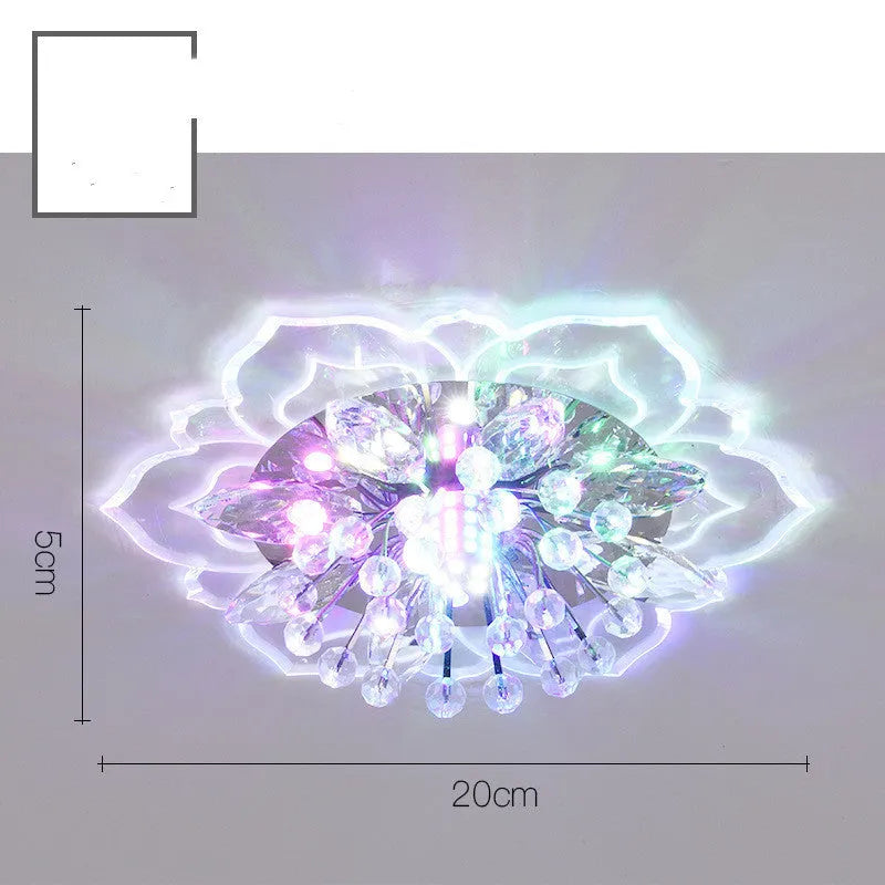 Small modern crystal ceiling lamp with flower-shaped shade in crystal, acrylic, and stainless steel materials