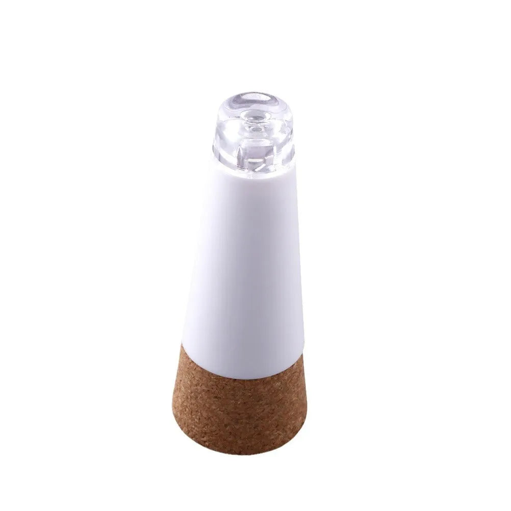 White plastic rechargeable LED bottle cap light with 15 LEDs, shown with battery box, measuring 30mm by 73mm.