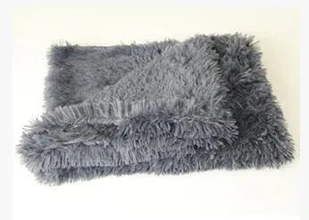 Long plush pet blanket in wool polyester blend showing dark grey, light grey and white colour options with size comparison